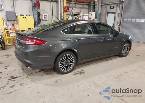 2017 Ford Fusion Energi Titanium from USA, damaged, VIN 3FA6P0SU9HR147148